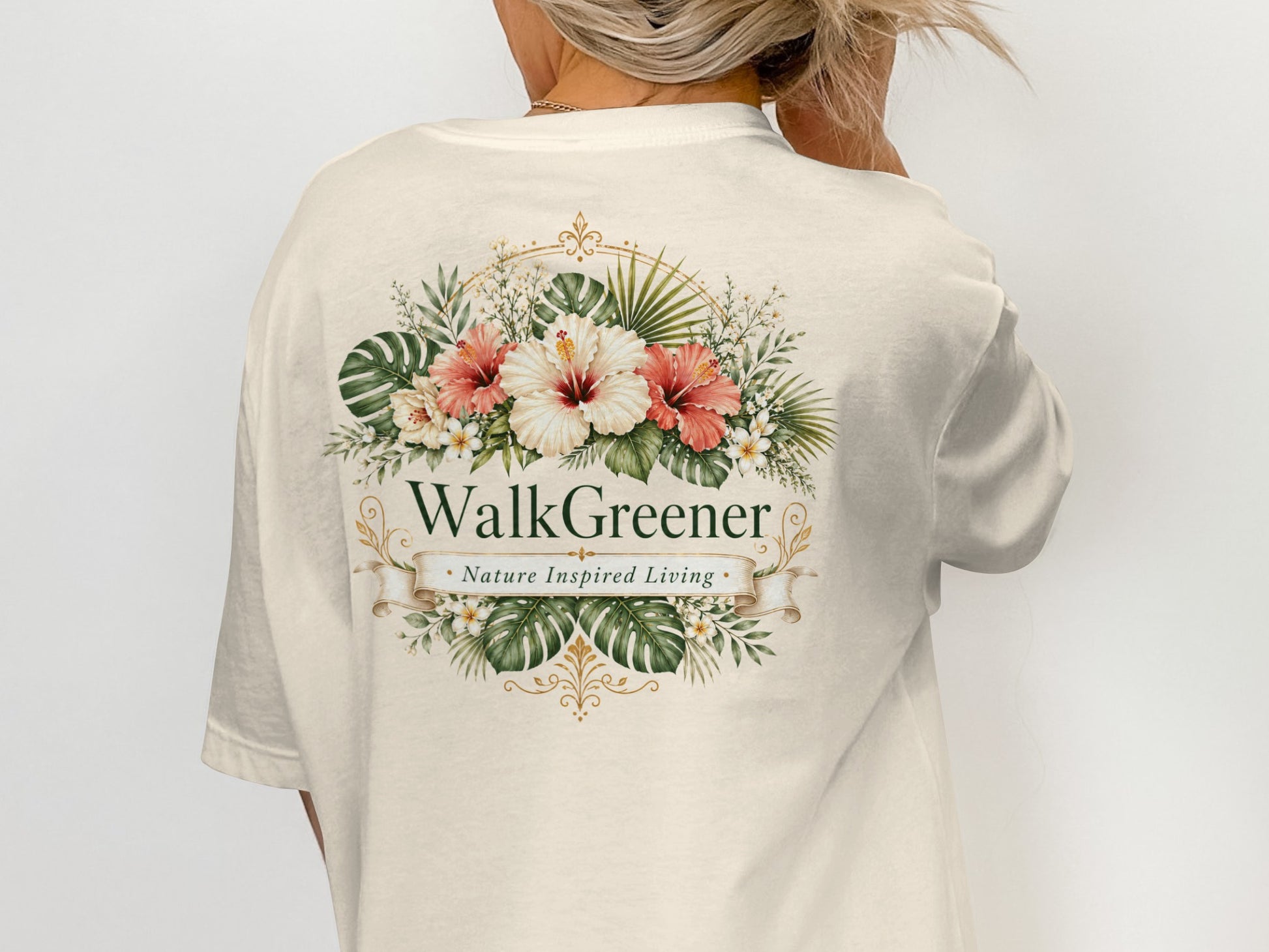 Cream t-shirt with "WalkGreener Nature Inspired Living" floral design on the back.